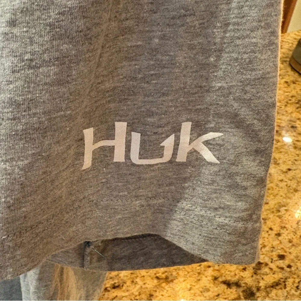 Huk men’s Outer Banks Angler t-shirt. Sharp blue print w/logos front/back/sleeve